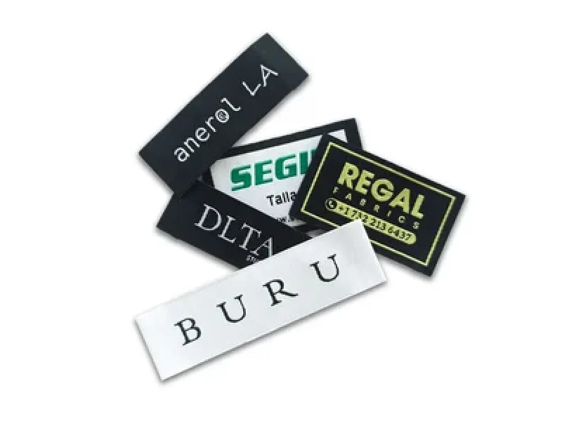 Birmingham Size Labels 3 Birmingham Size Labels shown as a UK textile label manufacturing example with hang tag size label and patch label application