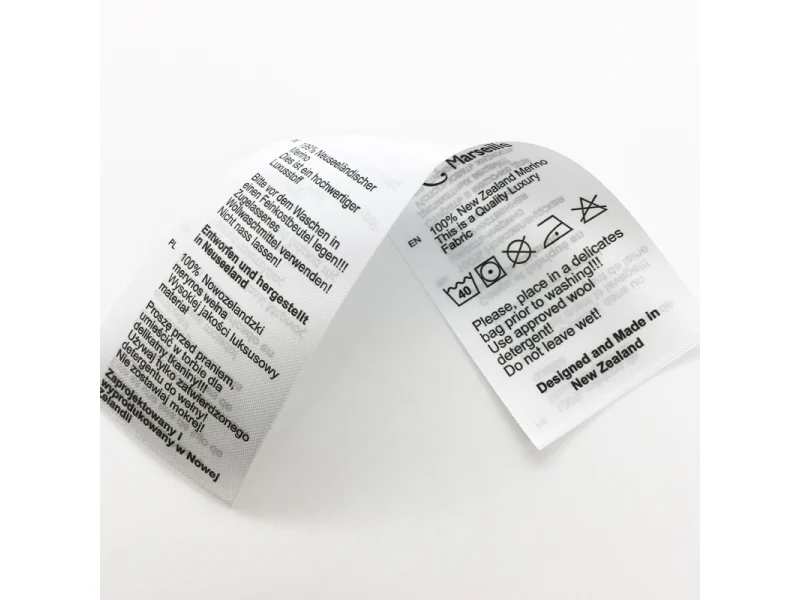 Care Labels shown as a UK textile label manufacturing example with printed fabric label and care label
