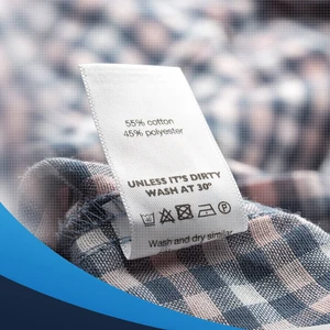Clothing Labels with Your Logo shown as a UK textile label manufacturing example with printed fabric label and care label