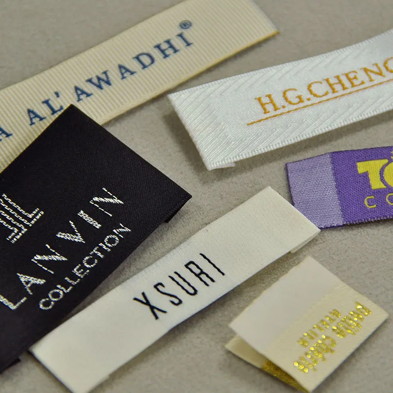 Custom Clothing Labels: Complete Buyer & Ordering Guide 2 Custom Clothing Labels shown as a UK textile label manufacturing example with printed fabric label and care label