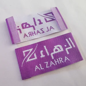 Custom Clothing Tags shown as a UK textile label manufacturing example with printed fabric label and care label