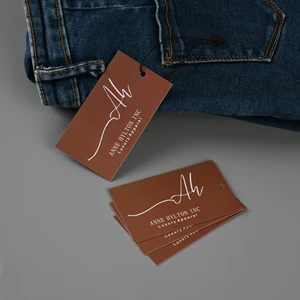 Custom Hang Tags: Retail Display & Paperstock Guide 1 Custom Hang Tags shown as a UK textile label manufacturing example with woven textile label example