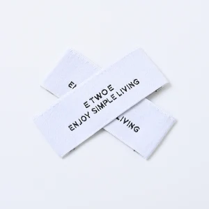 Personalised Clothing Labels shown as a UK textile label manufacturing example with hang tag size label and patch label application