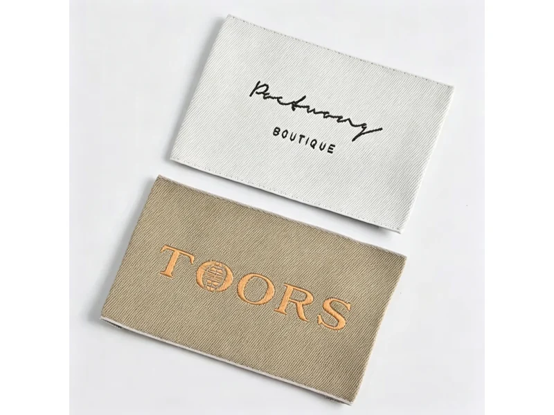 Custom Sew In Labels shown as a UK textile label manufacturing example with printed fabric label and care label